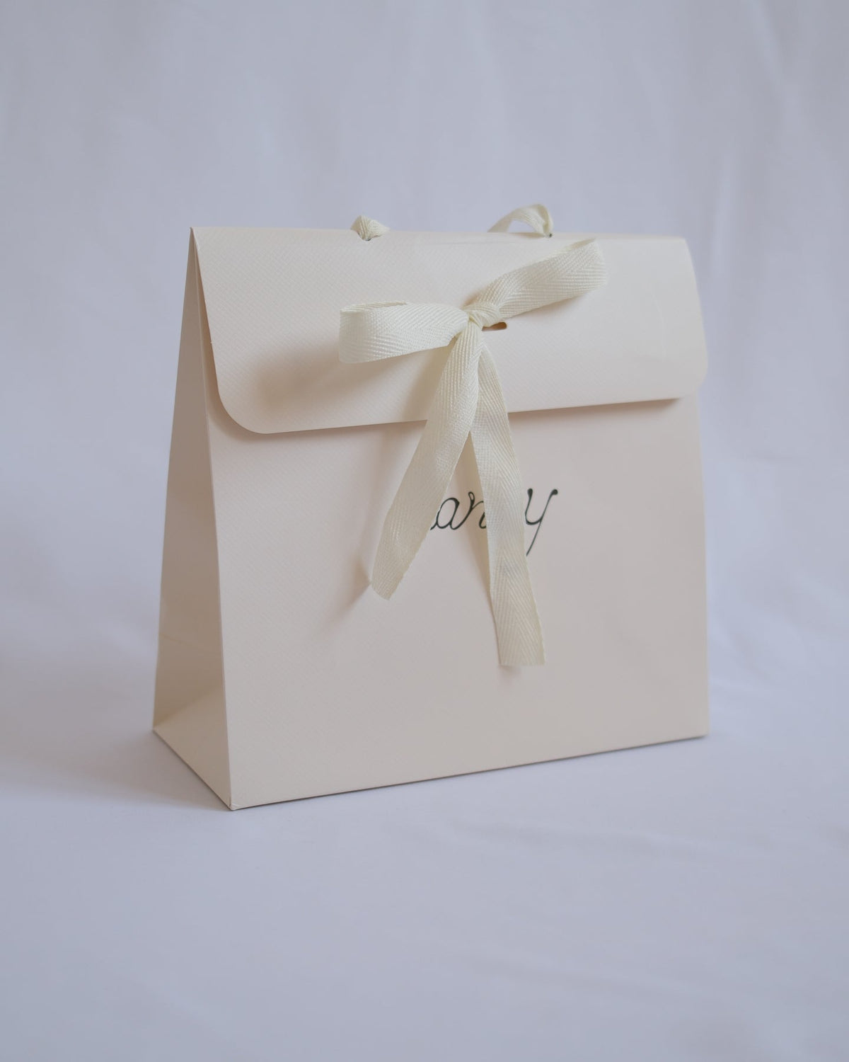 TANSY cream paper gift bag with cotton ribbon handles