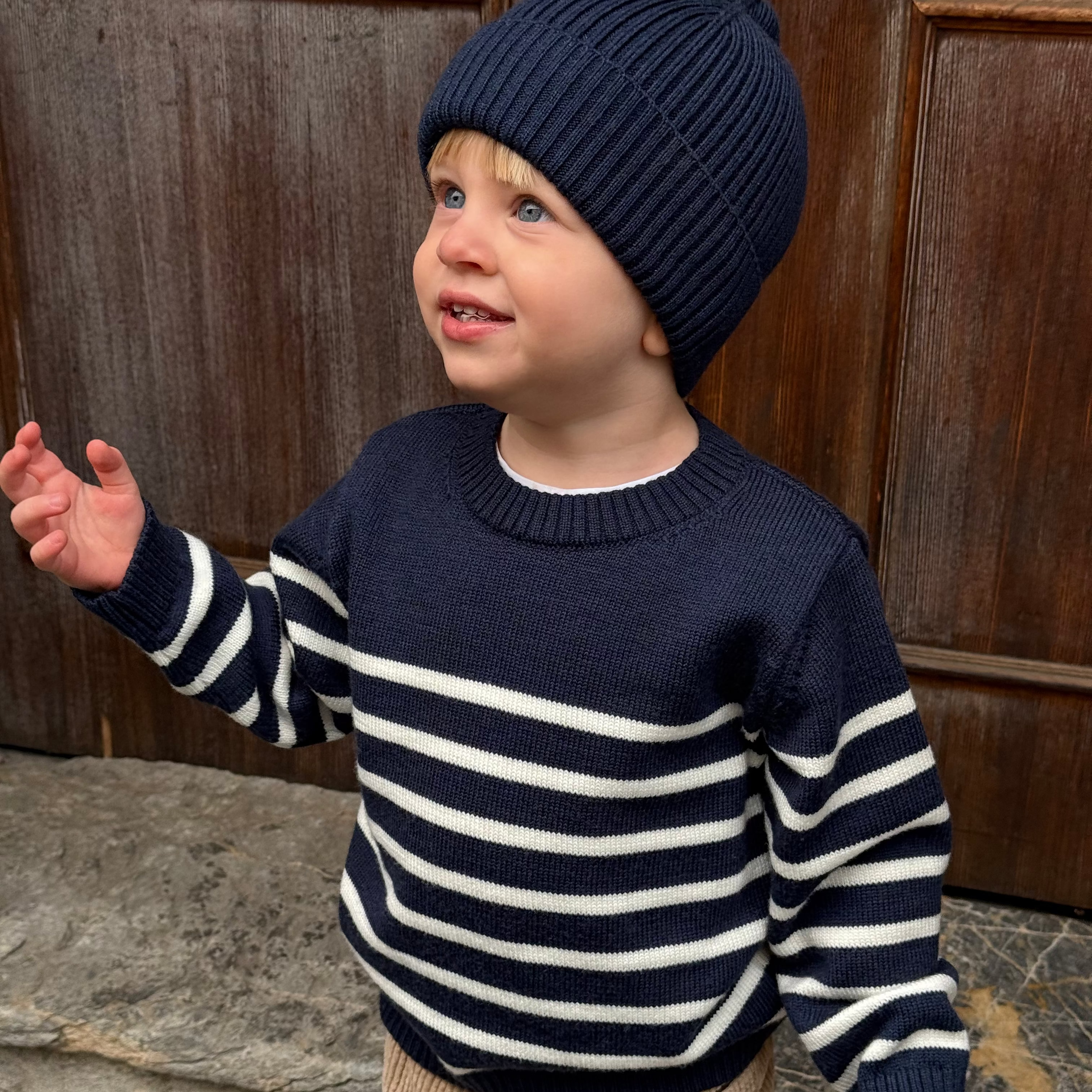 little boy wearing nautical stripe wool sweater tansy
