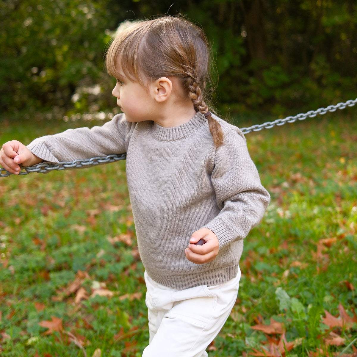 Lifestyle photograph of children's merino knitwear by TANSY