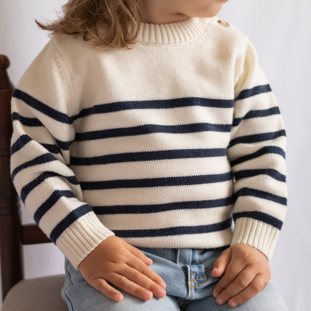 TANSY children's merino wool knitwear in an editorial photograph