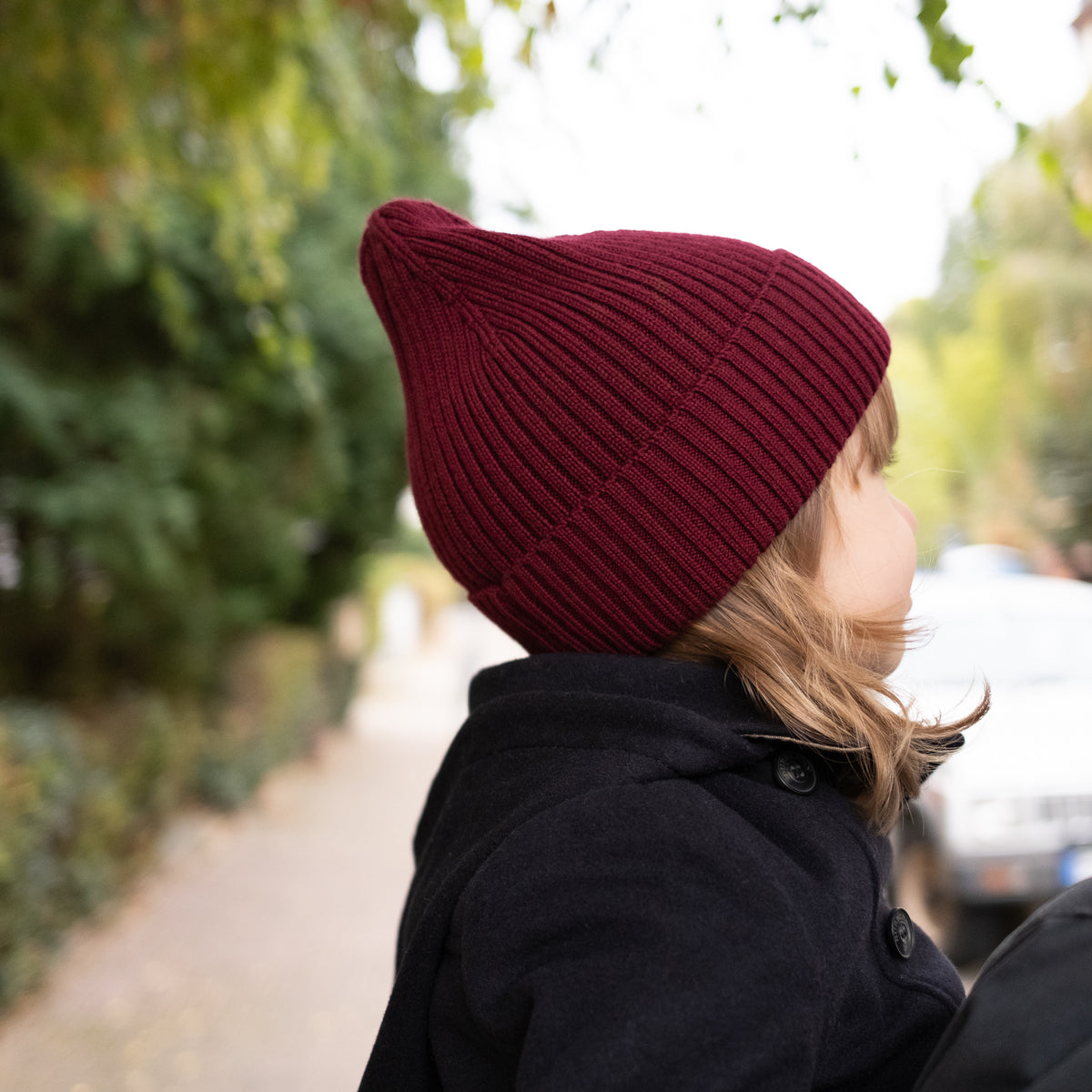 TANSY children's merino wool ribbed beanie, lifestyle photograph